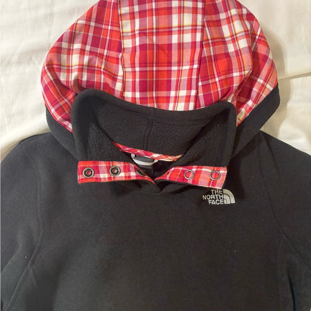The North Face Black Hoodie with Red Plaid Hood Trim